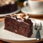 Moist and decadent Almond Flour Chocolate Cake served on a plate