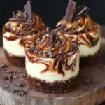 Mocha marble mini cheesecake topped with chocolate drizzle and coffee beans