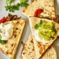 Delicious steak quesadilla inspired by fajitas on a plate.