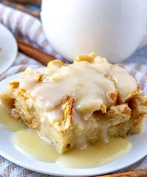 Deliciously creamy bread pudding served with a caramel sauce