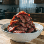 thin sliced beef marinated in soy sauce with glossy texture ready for cooking