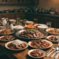Family dinner table with thin sliced beef dishes, rice, gravy, and vegetables in a cozy kitchen setting